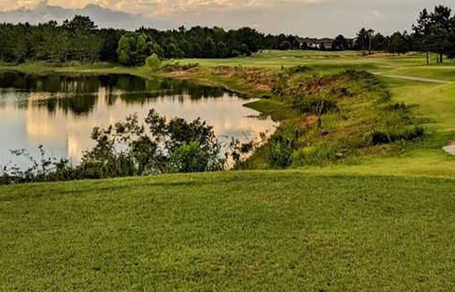 golf course with pond